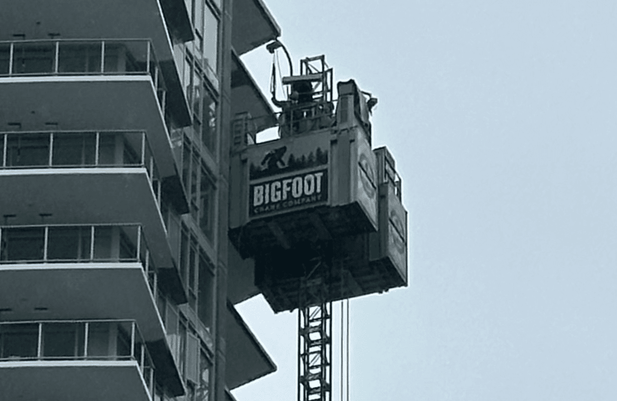 A high-capacity Fraco SEH-7000 dual car hoist with two cages installed on a high-rise, available for rent.