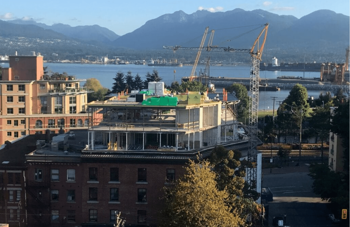 2008 Koenig K1035TKG self-erecting tower crane on a job site.