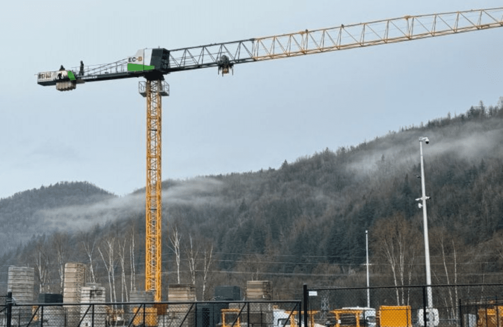 A 2023 Liebherr 125 EC-B 6 top-slewing tower crane assembled at a job site, available for sale from Bigfoot Crane Company.