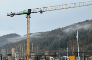 A 2023 Liebherr 125 EC-B 6 top-slewing tower crane assembled at a job site, available for sale from Bigfoot Crane Company. 